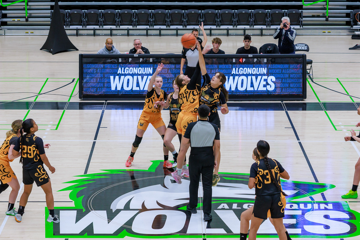 U16 girls basketball players jump for the opening tip-off during the National Capital All-Star Classic at the Jack Doyle Athletics and Recreation Centre in Ottawa.