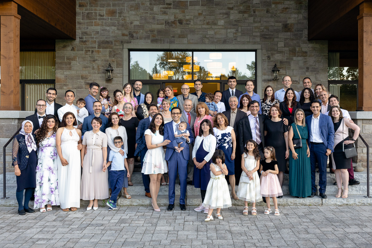 Aali poses with his family and friends during a huge outdoor family photo in Ottawa.