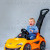 My baby boy behind his McLaren 570S